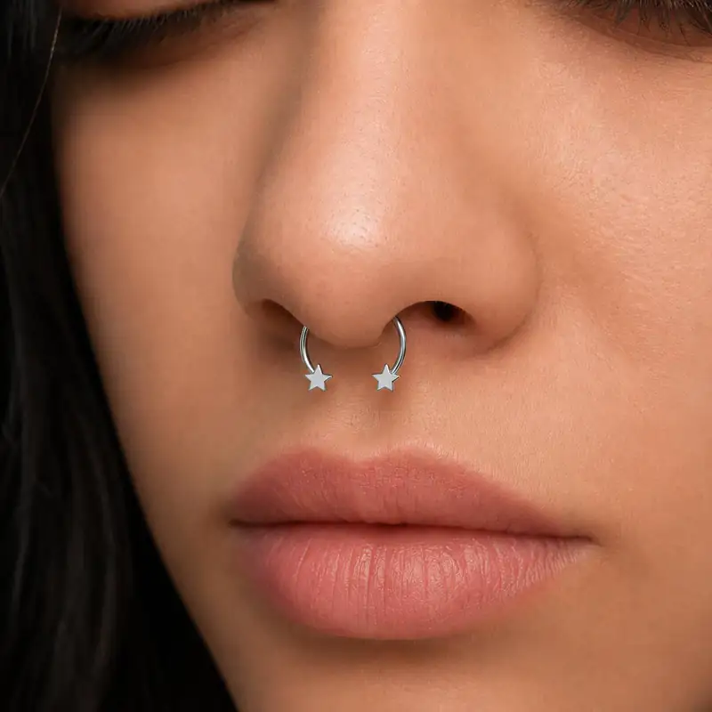 پیرسینگ فیک سپتوم مگنتی نقره‌ای طرح ستاره روی بینی