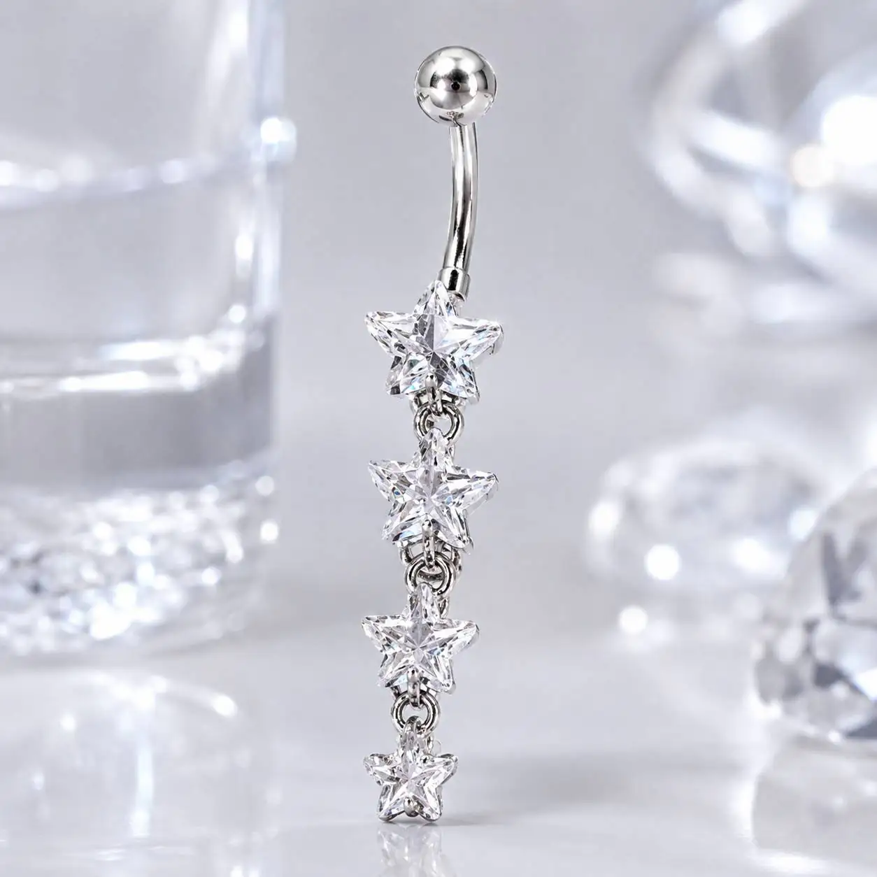 crystal-star-navel-piercing-detail پیرسینگ ناف با آویز ستاره ای نقره ای جواهری