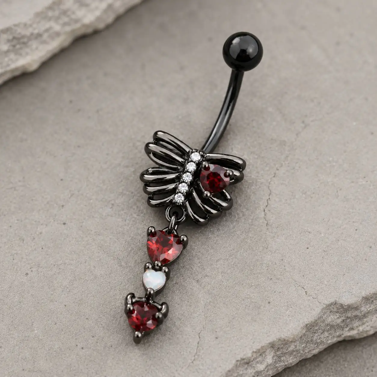 red-gem-rib-cage-belly-ring-closeup.jpg