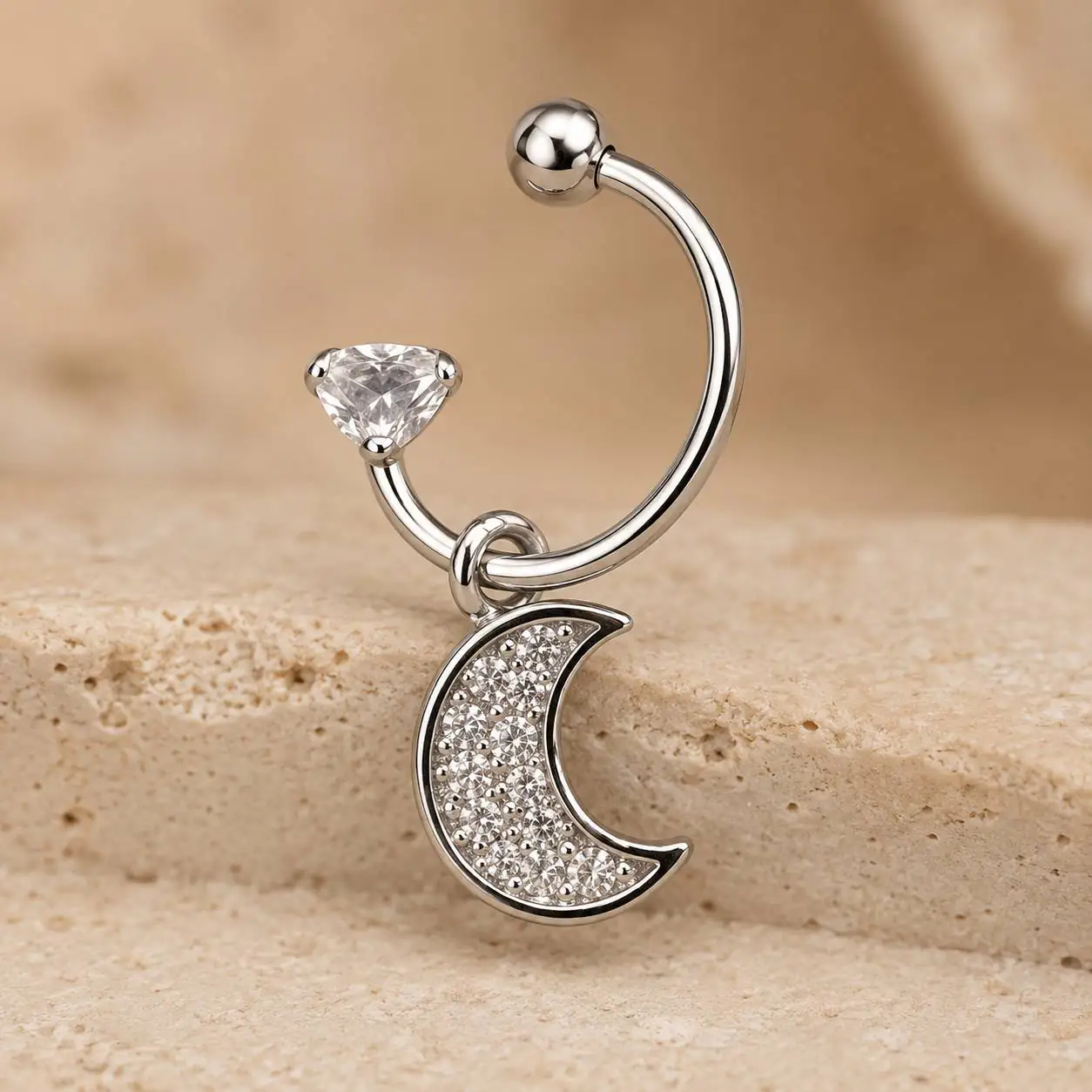 silver-crescent-moon-nose-ring-front-view پیرسینگ بینی حلقهای نقرهای با نگین مثلثی و آویز هلال ماه