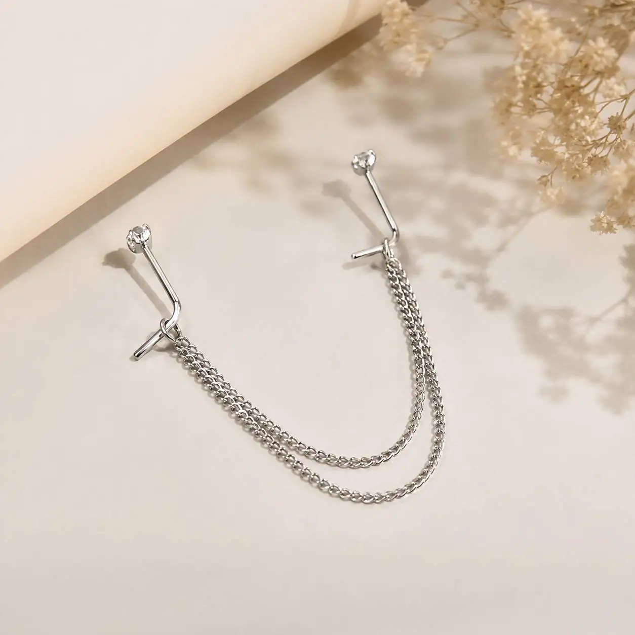 silver-double-chain-nose-piercing-product پیرسینگ بینی زنجیری دو ردیفه نقرهای با نگین کریستالی ظریف