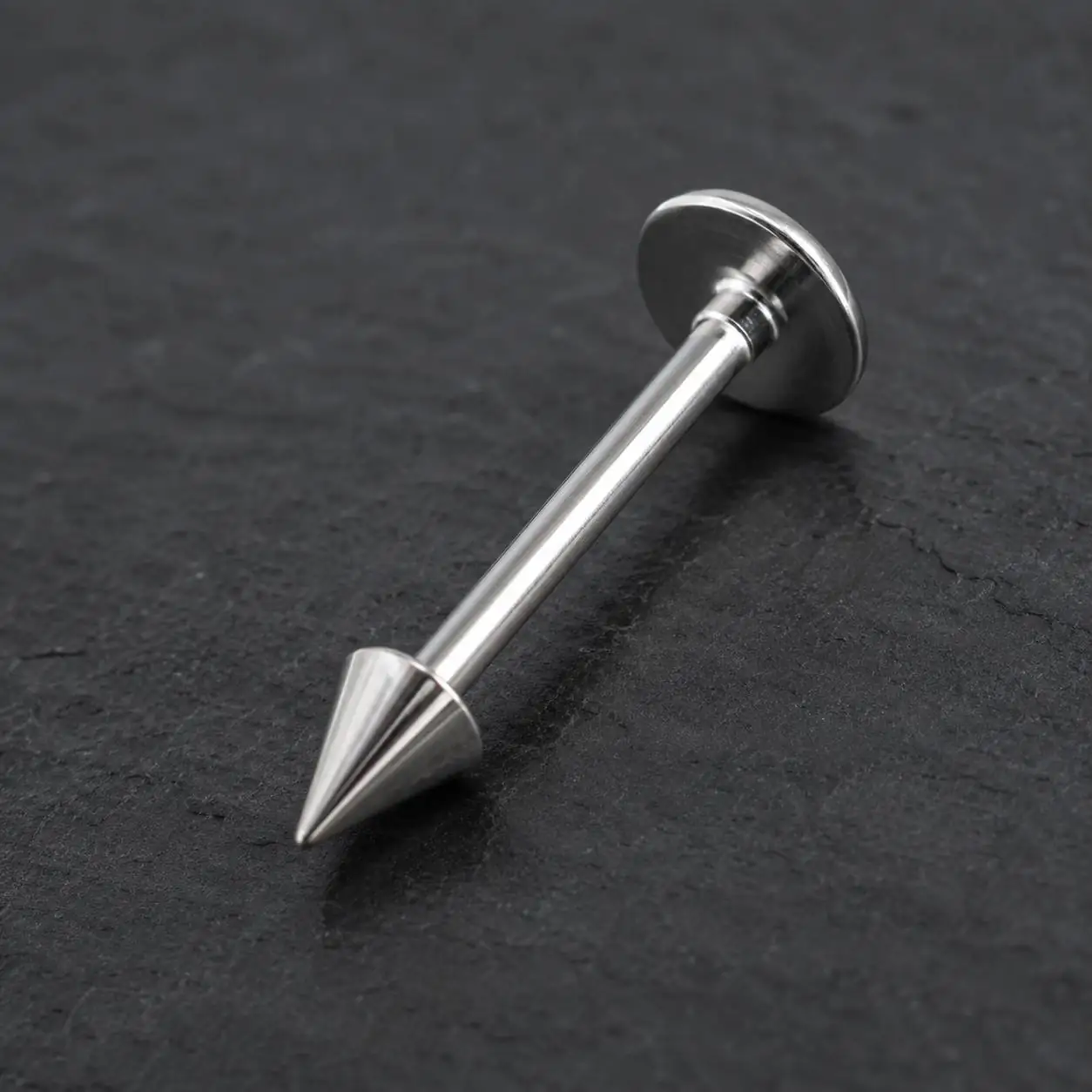 flat-back-cone-labret-piercing-side-view
