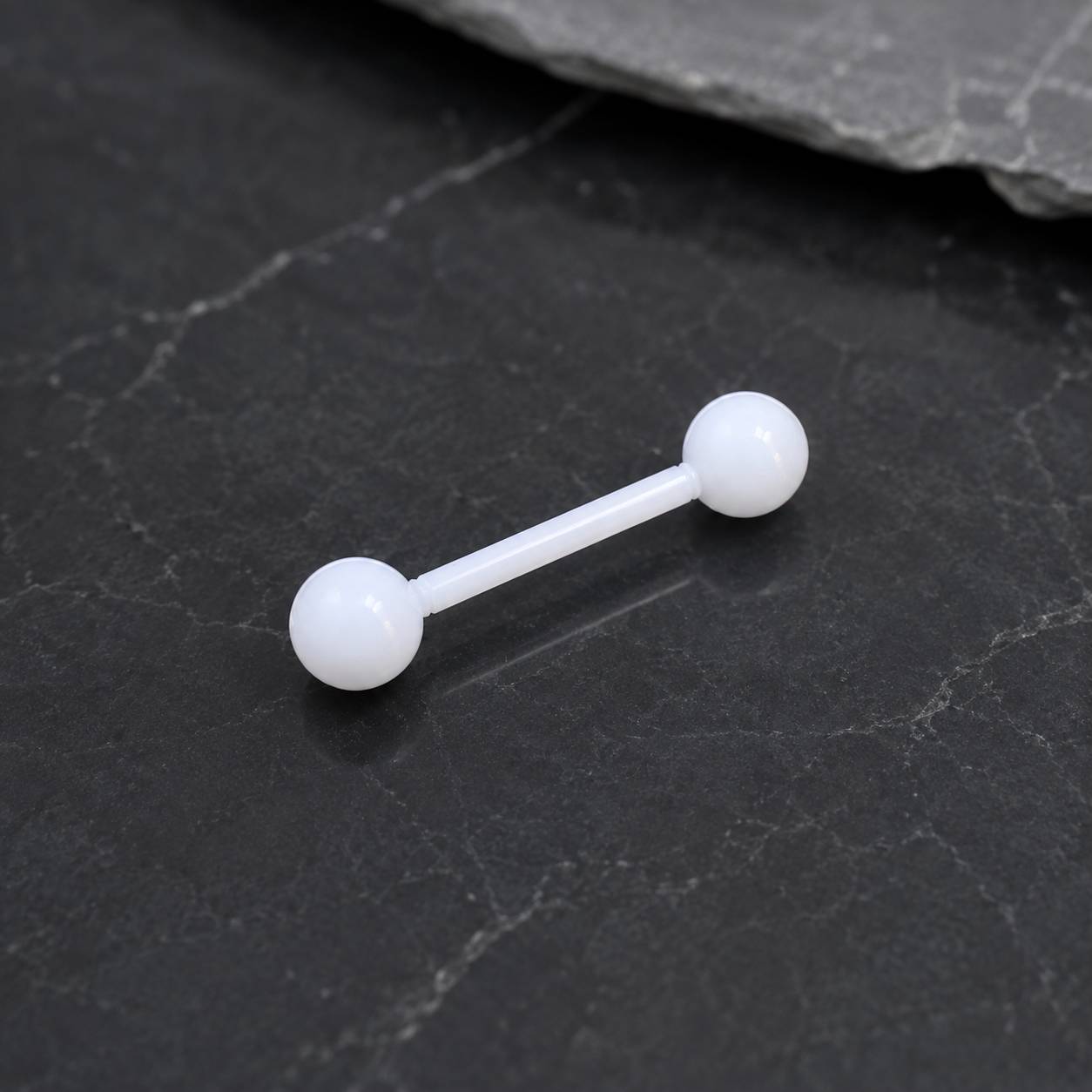 پیرسینگ سیلیکونی چال لپ سفید با میله مستقیم و دو سر کروی