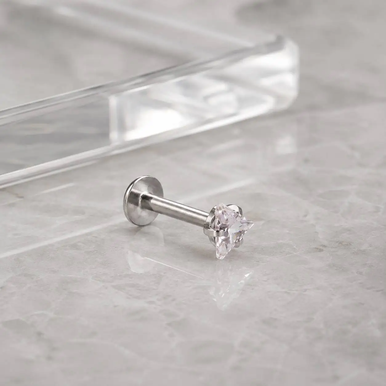 silver-flat-back-star-piercing