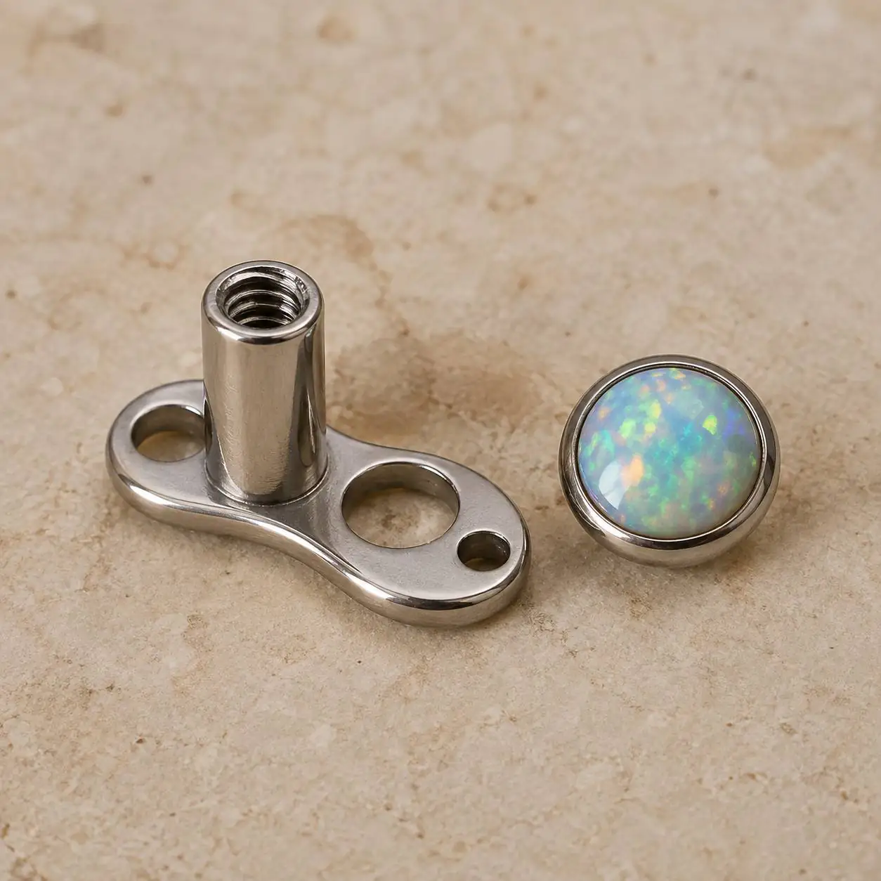 white-opal-microdermal-piercing-front-view پیرسینگ میکرودرمال نگین اپال سفید با قاب نقرهای