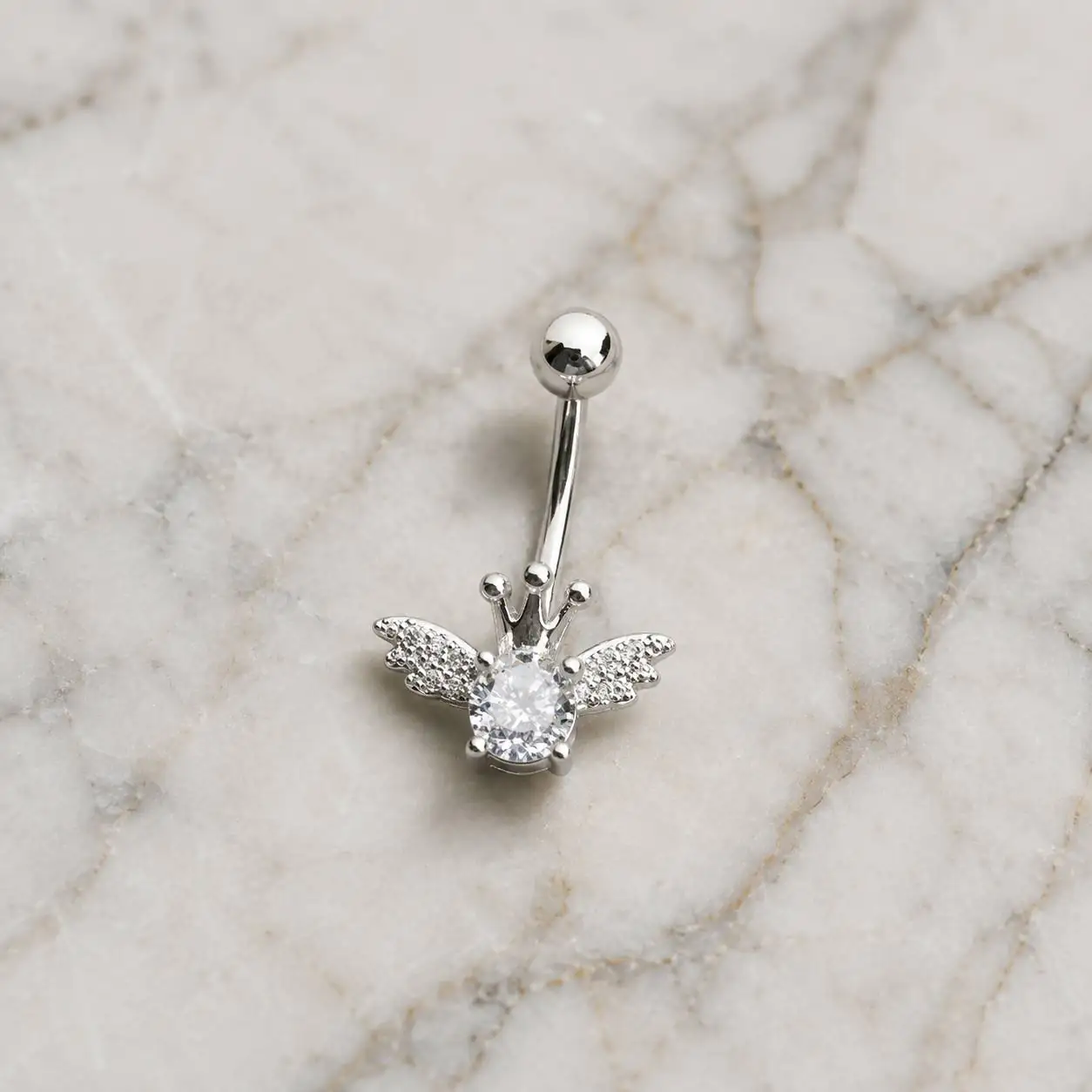 crown-gem-belly-button-piercing