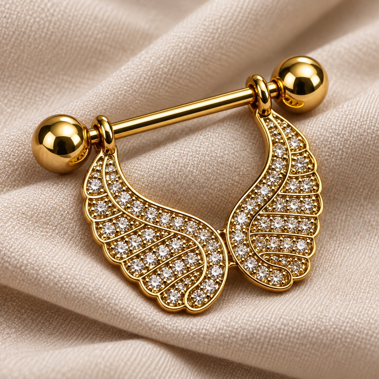 gold-wing-nipple-barbell-jewelry-closeup