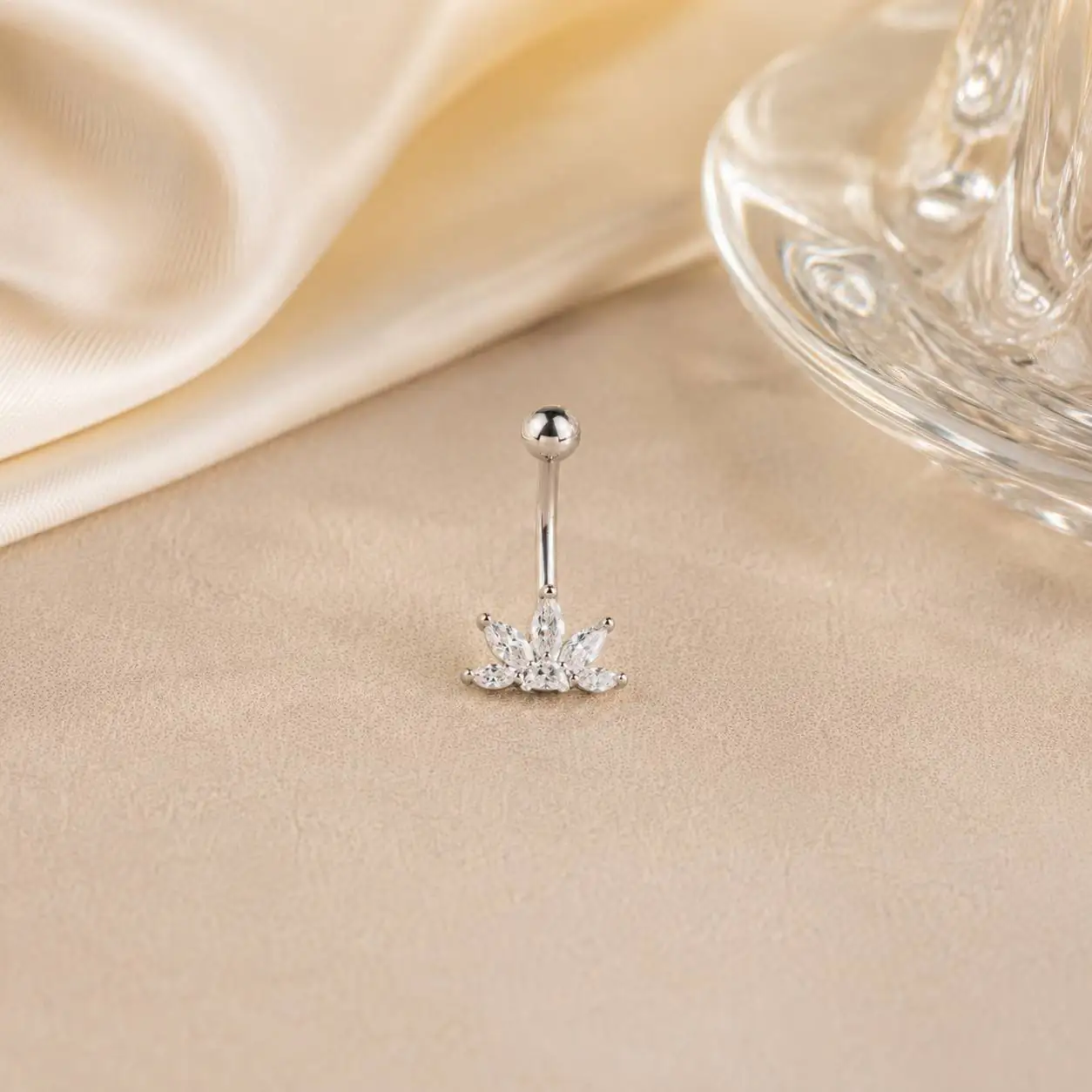 silver-lotus-navel-piercing-front-view